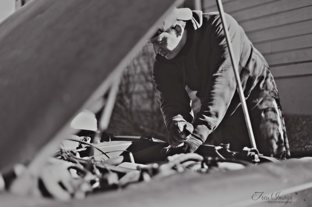 Branden fixing car.blog